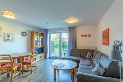 Ein Sitzbereich in der Unterkunft Haus Stranddüne Wohnung 17