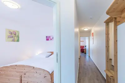 Ein Bett oder Betten in einem Zimmer der Unterkunft Haus Stranddüne Wohnung 17