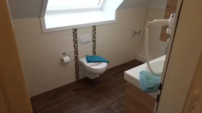 Ein Badezimmer in der Unterkunft Hotel Dorfkrug Büsum