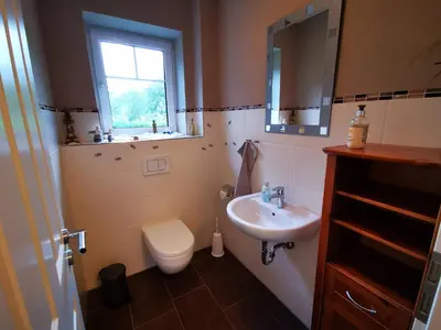 Ein Badezimmer in der Unterkunft Traumhaftes Ferienhaus an der Nordseeküste