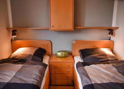 Ein Bett oder Betten in einem Zimmer der Unterkunft Deichkoje