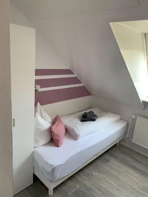Ein Bett oder Betten in einem Zimmer der Unterkunft Wohnung 