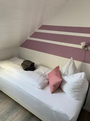 Ein Bett oder Betten in einem Zimmer der Unterkunft Wohnung 
