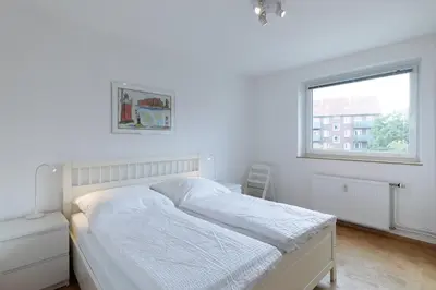 Ein Bett oder Betten in einem Zimmer der Unterkunft Wohnung 27