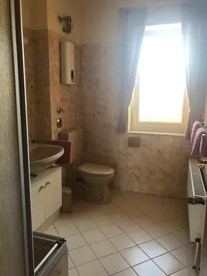 Ein Badezimmer in der Unterkunft Ferienwohnung Op'n Rugenbarg 70 OG