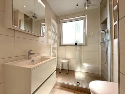 Ein Badezimmer in der Unterkunft Strandhochhaus J12