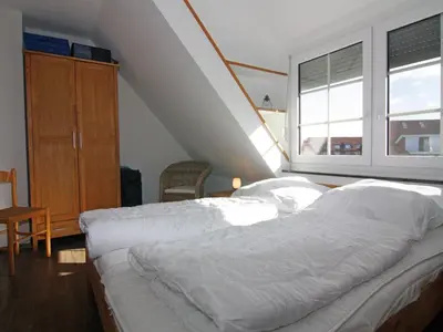 Ein Bett oder Betten in einem Zimmer der Unterkunft Terraced house, Friedrichkoog-Spitze