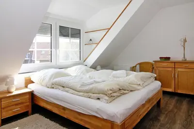Ein Bett oder Betten in einem Zimmer der Unterkunft Terraced house, Friedrichkoog-Spitze