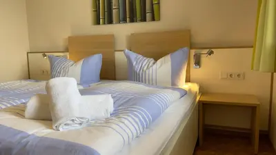 Ein Bett oder Betten in einem Zimmer der Unterkunft Haus Horizont Fewo Nr 21
