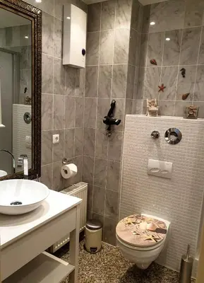 Ein Badezimmer in der Unterkunft Maritime Ferienwohnung in Strandnähe