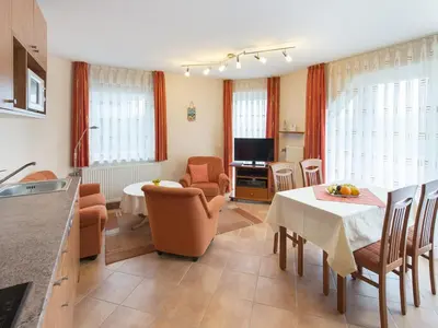 Ein Sitzbereich in der Unterkunft Haus Dünenglück, Whg. 14