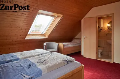 Ein Bett oder Betten in einem Zimmer der Unterkunft K357 - Hotel & Restaurant 