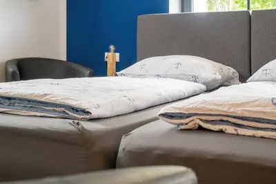 Ein Bett oder Betten in einem Zimmer der Unterkunft K357 - Hotel & Restaurant 