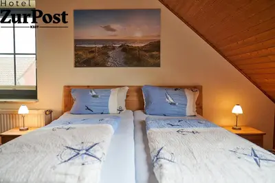 Ein Bett oder Betten in einem Zimmer der Unterkunft K357 - Hotel & Restaurant 