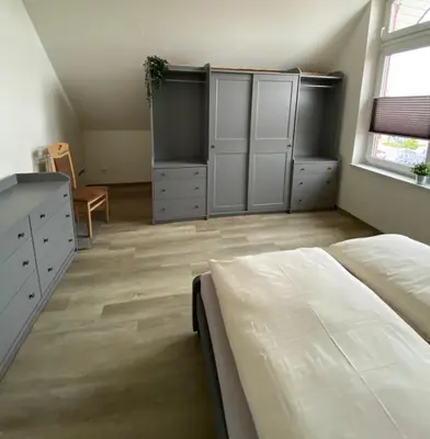Ein Bett oder Betten in einem Zimmer der Unterkunft MarC5 Hotel Cadenberge
