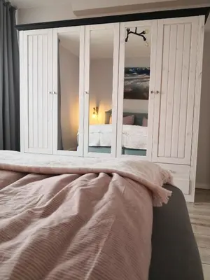 Ein Bett oder Betten in einem Zimmer der Unterkunft Ferienwohnung für große Familien im Haus Akunak
