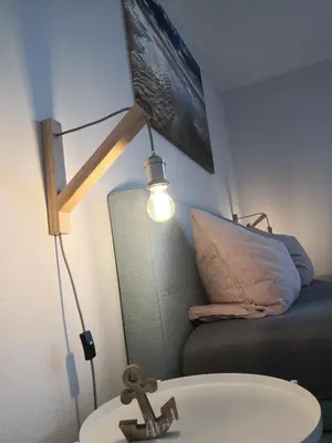 Ein Bett oder Betten in einem Zimmer der Unterkunft Ferienwohnung für große Familien im Haus Akunak