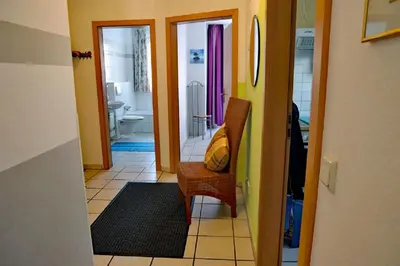 Ein Sitzbereich in der Unterkunft Oasis 01