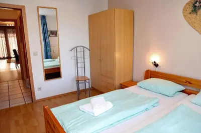 Ein Bett oder Betten in einem Zimmer der Unterkunft Oasis 03