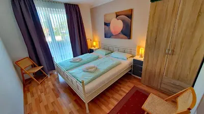 Ein Bett oder Betten in einem Zimmer der Unterkunft Oasis 13