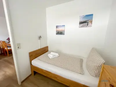 Ein Bett oder Betten in einem Zimmer der Unterkunft Residenz Hohe Worth Wohnung 307