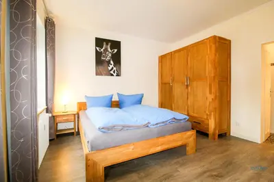 Ein Bett oder Betten in einem Zimmer der Unterkunft Haus Frauenpreiß Wohnung 62