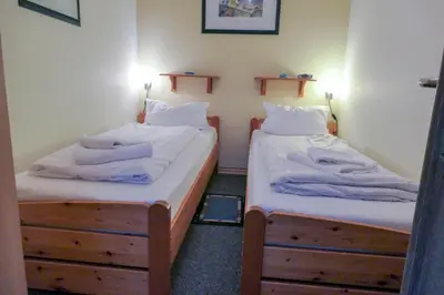 Ein Bett oder Betten in einem Zimmer der Unterkunft Frische Brise 03.04