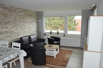 Ein Sitzbereich in der Unterkunft Ferienwohnung Meerglück