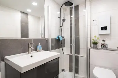 Ein Badezimmer in der Unterkunft Apartment Enjoy