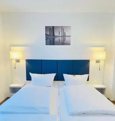 Ein Bett oder Betten in einem Zimmer der Unterkunft Haus zur Heimat