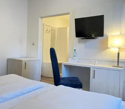 Ein Bett oder Betten in einem Zimmer der Unterkunft Haus zur Heimat