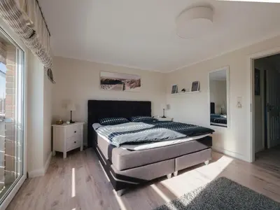 Ein Bett oder Betten in einem Zimmer der Unterkunft Beachcomber House A