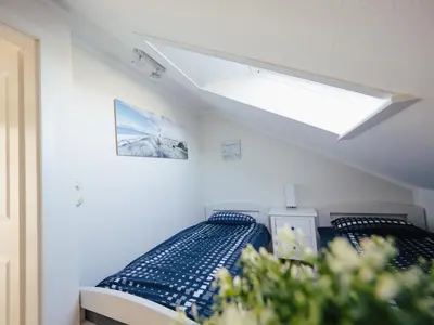 Ein Bett oder Betten in einem Zimmer der Unterkunft Beachcomber House A