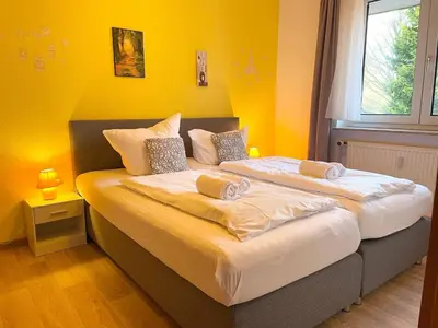 Ein Bett oder Betten in einem Zimmer der Unterkunft Ferienwohnung 