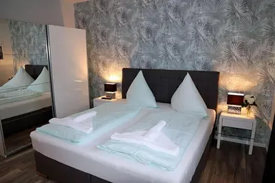 Ein Bett oder Betten in einem Zimmer der Unterkunft Zyrus 03