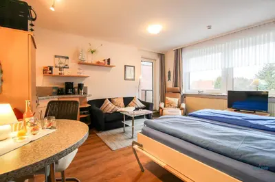 Ein Bett oder Betten in einem Zimmer der Unterkunft Strand und zentrumsnahe Ferienwohnung für bis zu 2 Personen in Döse