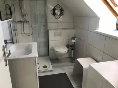 Ein Badezimmer in der Unterkunft Gleich hinterm Deich 4