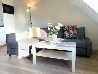 Ein Sitzbereich in der Unterkunft Ferienwohnung 'Haus Ingeborg, Wohnung 2/OG'