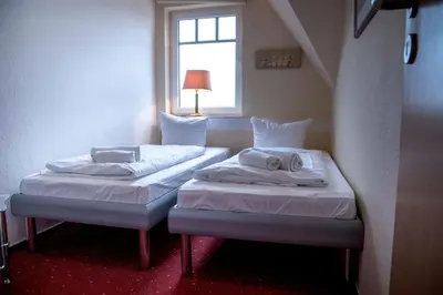 Ein Bett oder Betten in einem Zimmer der Unterkunft Ferienhaus 'Haus Eversand'