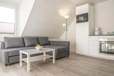 Ein Sitzbereich in der Unterkunft Ferienwohnung 'Haus Ingeborg, Wohnung 3/OG'