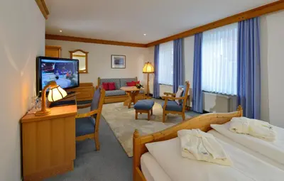 Ein Bett oder Betten in einem Zimmer der Unterkunft Ringhotel Gardels