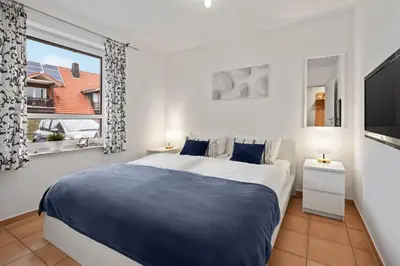 Ein Bett oder Betten in einem Zimmer der Unterkunft FewoInSahlenburg