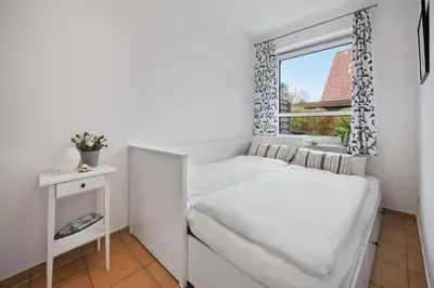 Ein Bett oder Betten in einem Zimmer der Unterkunft FewoInSahlenburg