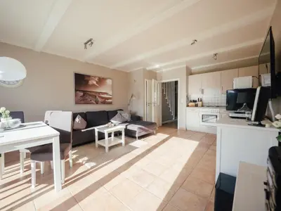 TV/Unterhaltungsangebot in der Unterkunft Beachcomber House B