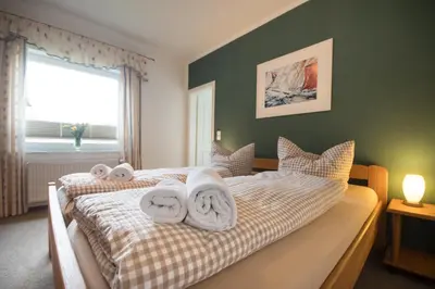 Ein Bett oder Betten in einem Zimmer der Unterkunft Hotel Nige Hus