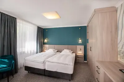 Ein Bett oder Betten in einem Zimmer der Unterkunft Hotel Seelust
