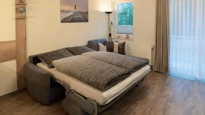 Ein Sitzbereich in der Unterkunft Villa Döser Strand