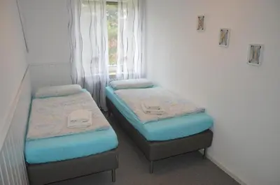 Ein Bett oder Betten in einem Zimmer der Unterkunft Ferienwohnung Meerzeit