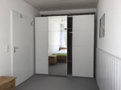Ein Bett oder Betten in einem Zimmer der Unterkunft Ferienwohnung Meerzeit