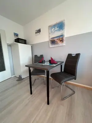 Ein Sitzbereich in der Unterkunft Studio Sam